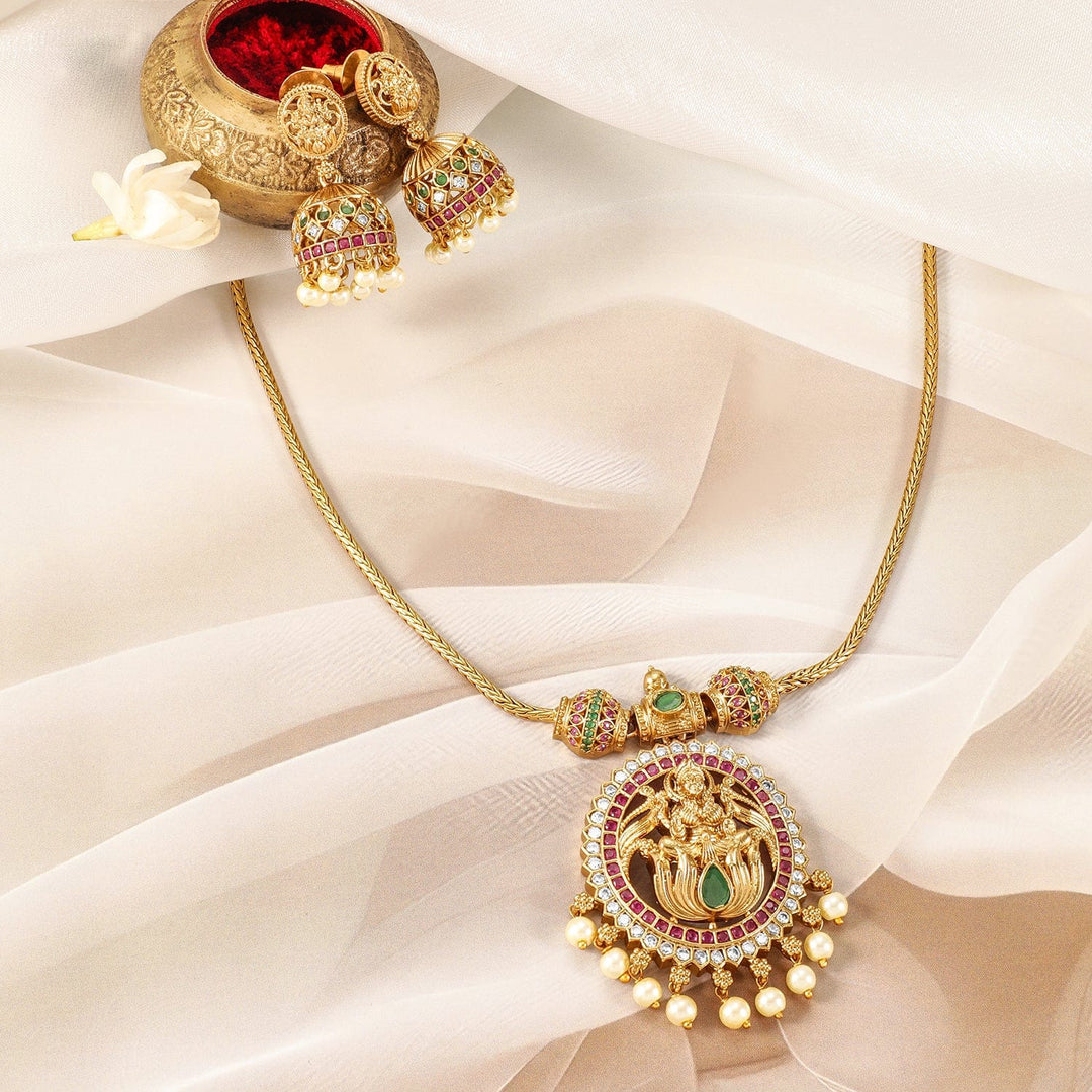 Gold-Plated Ruby, Emerald & CZ Studded Laxmi Temple Necklace Set with Pearl Drop