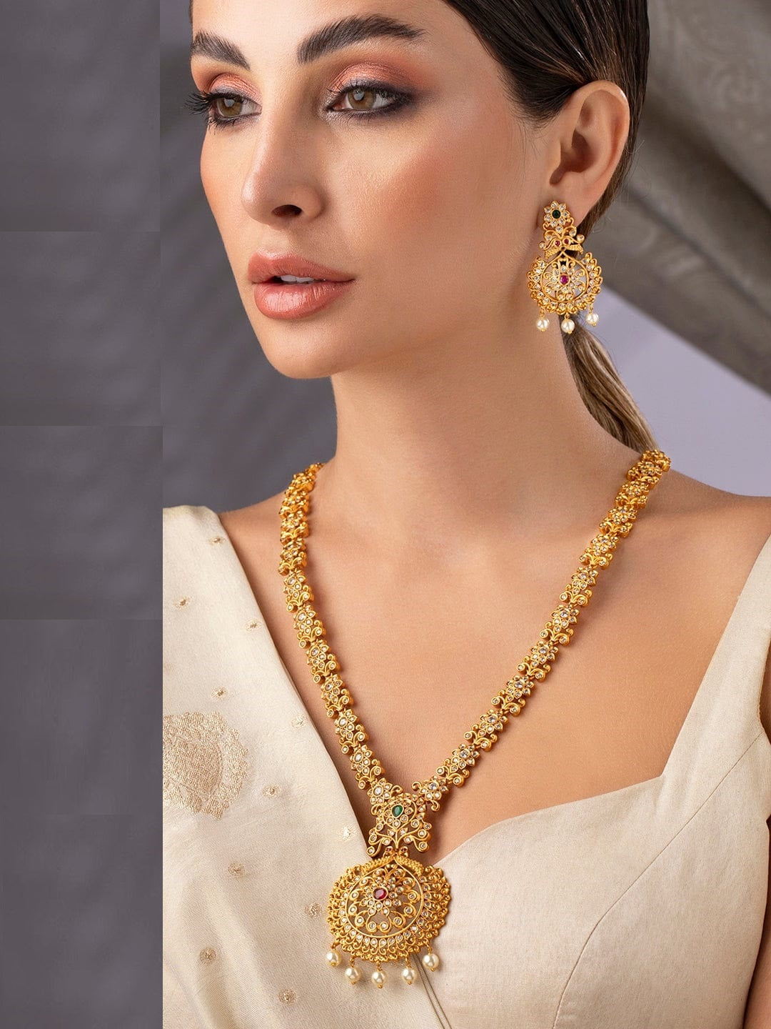 Gold-Toned Stone-Studded Handcrafted Jewellery Set